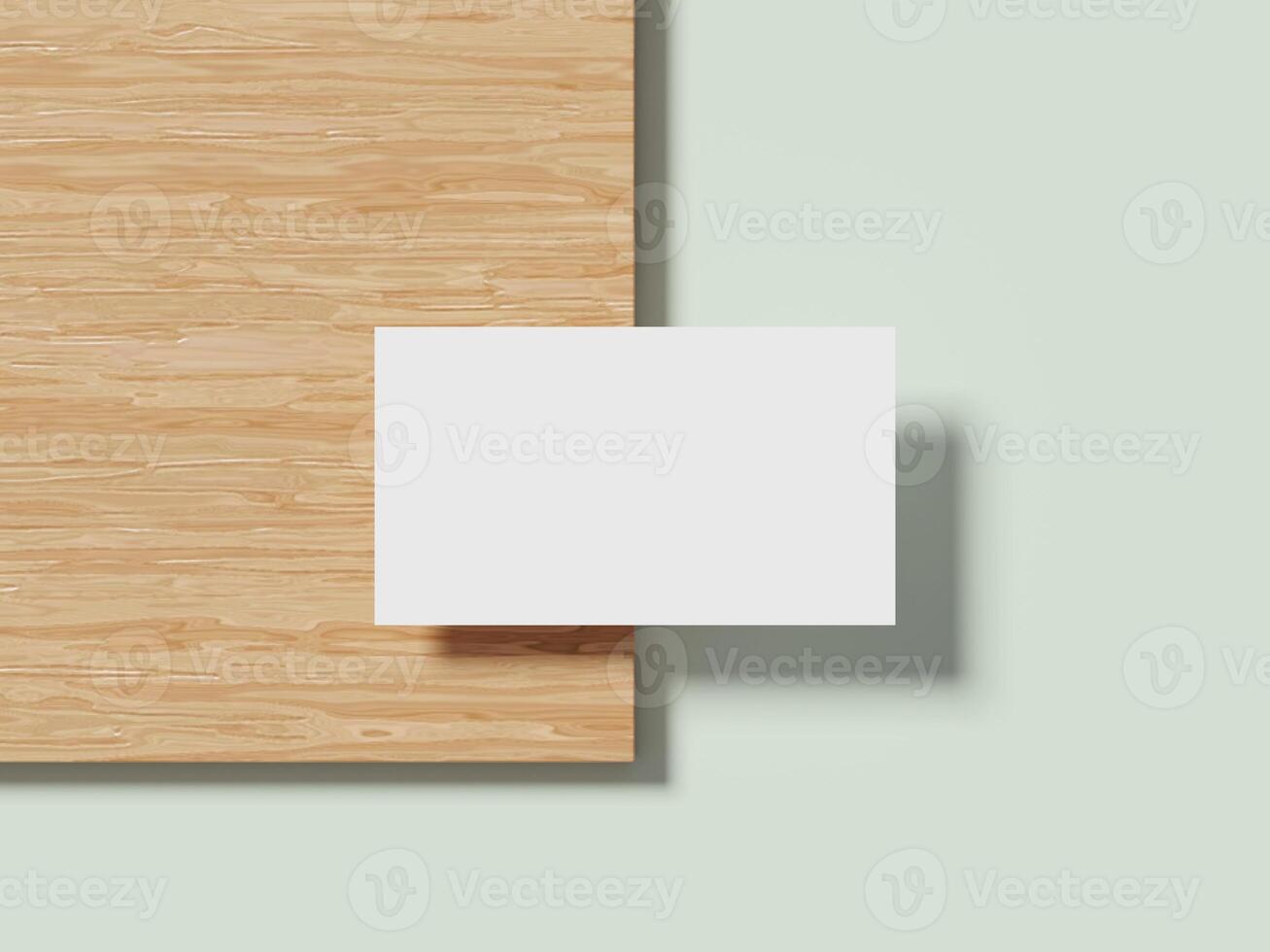 Minimalist white business card resting on a wooden surface with a subtle shadow, creating a clean and professional look. photo