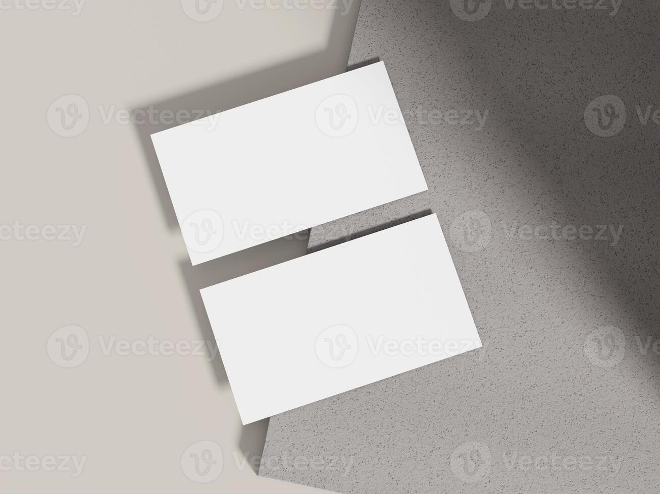 Business card mockup positioned on a grey cement block with lighting, perfect for modern branding presentations. photo