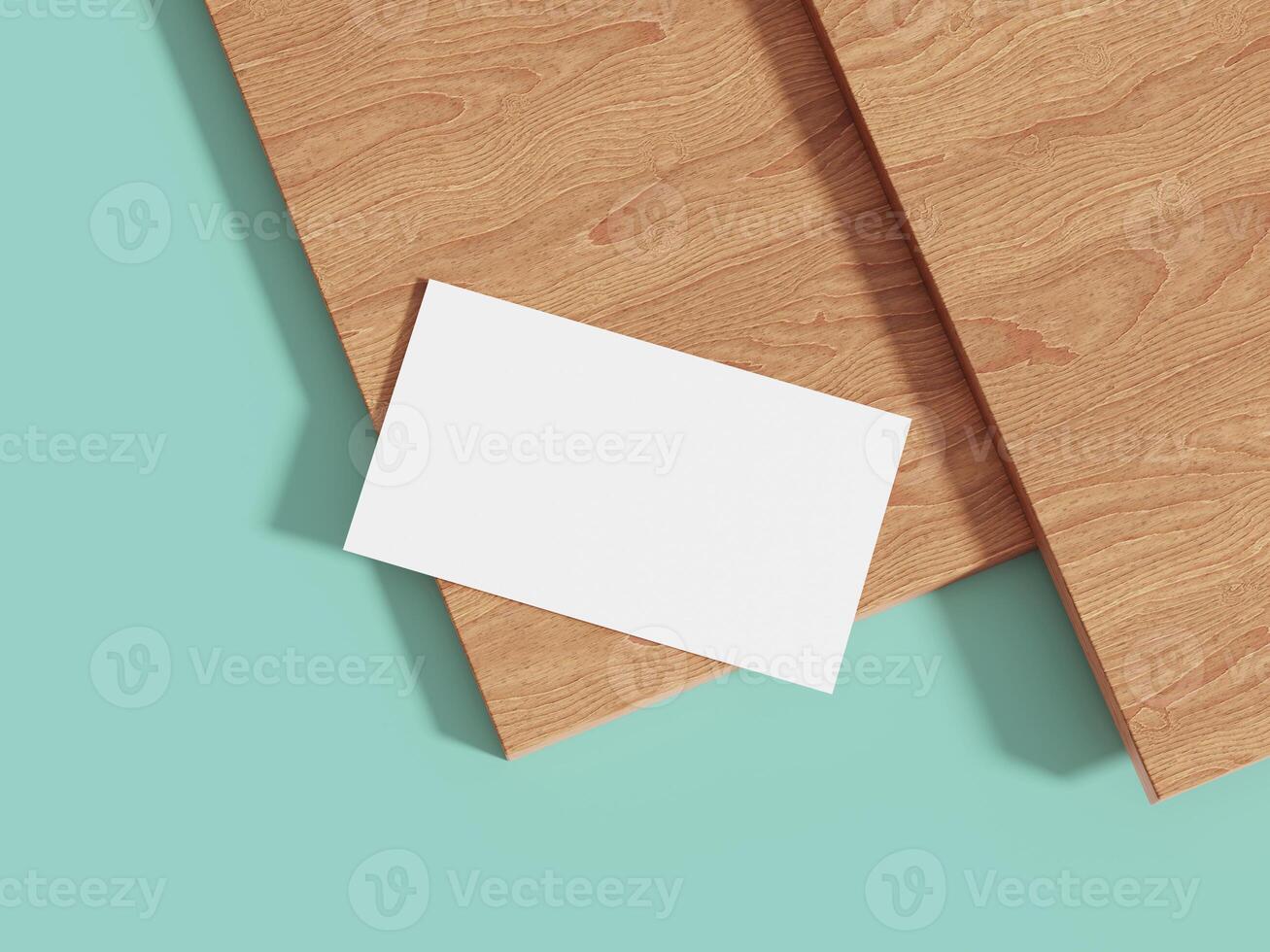 A clean and minimalistic business card mockup on a wooden surface with a light blue background, perfect for showcasing professional branding designs. photo