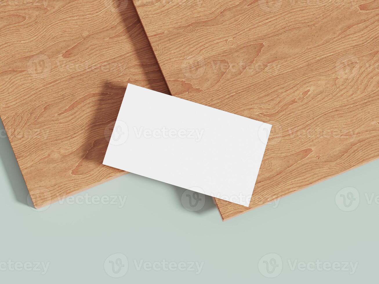 Business card mockup placed on a wooden surface with soft lighting, offering a neutral, elegant look for presenting modern brand identity. photo