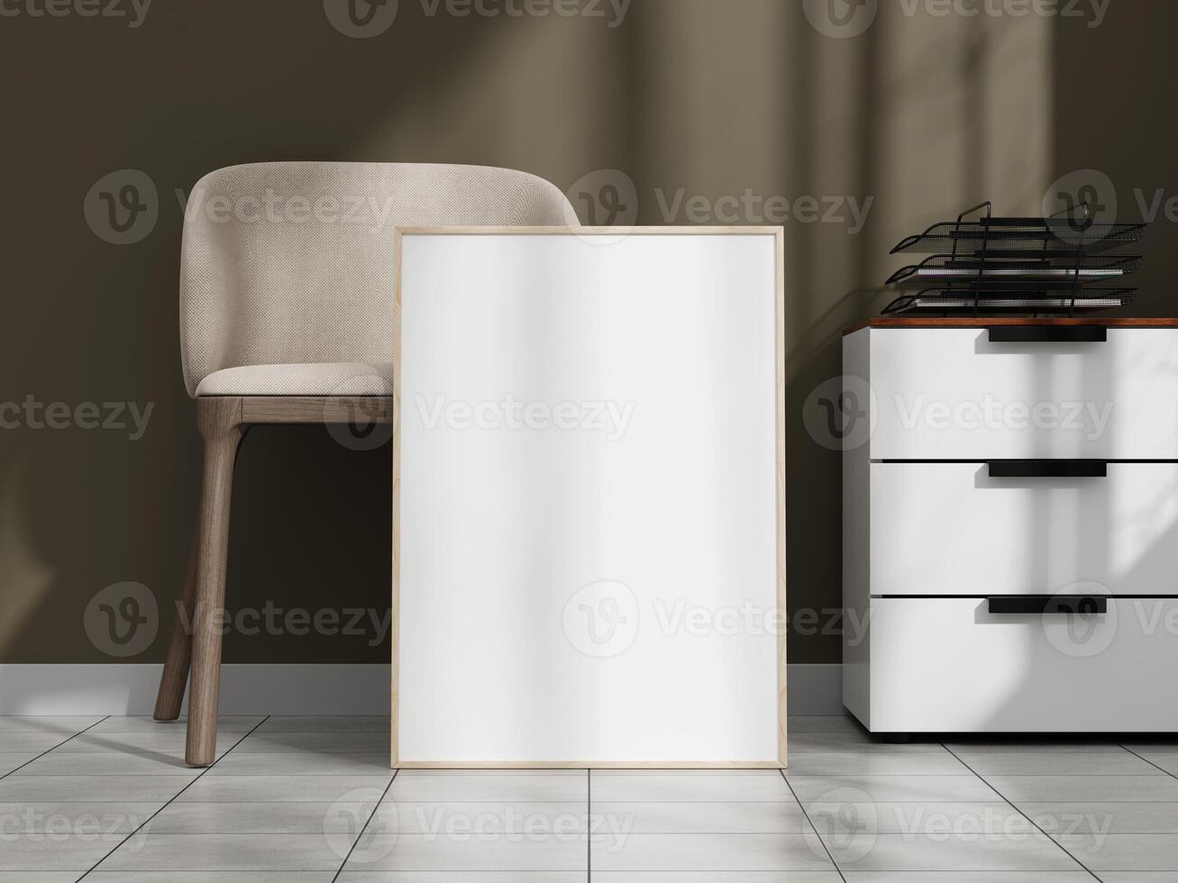 White poster frame mockup leaning against the wall beside a minimalist chair and drawer unit in a warm. photo