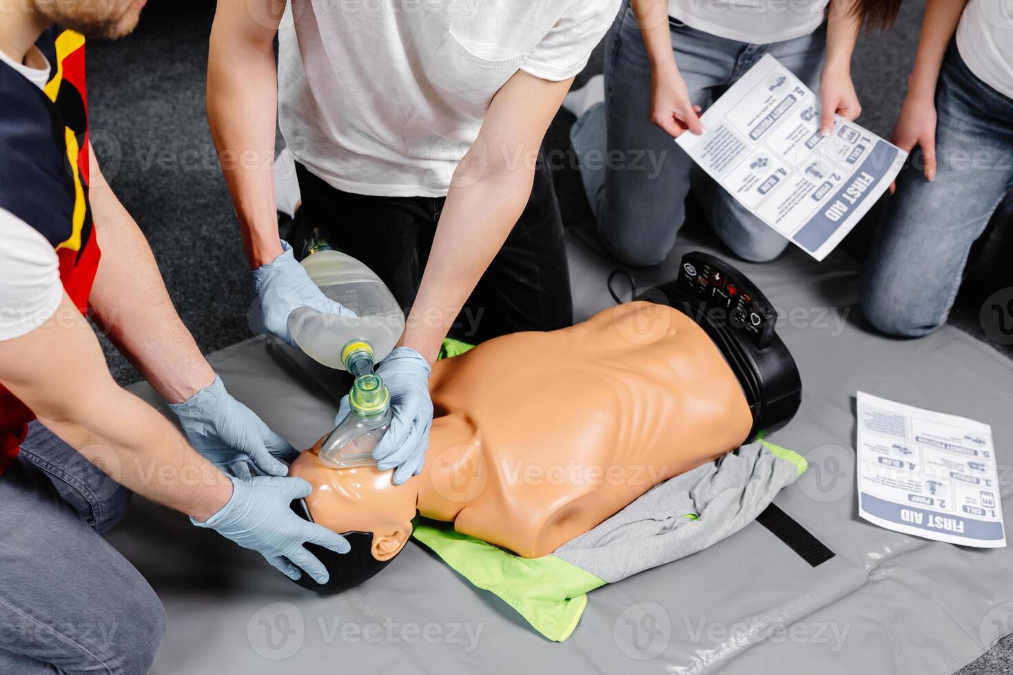 First Aid Training in Cardiopulmonary resuscitation. First aid course on cpr dummy photo