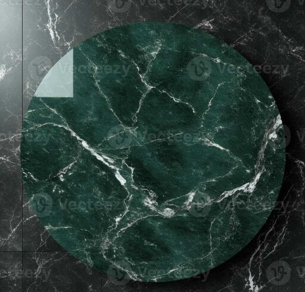 A circular marble table with a green marble top photo