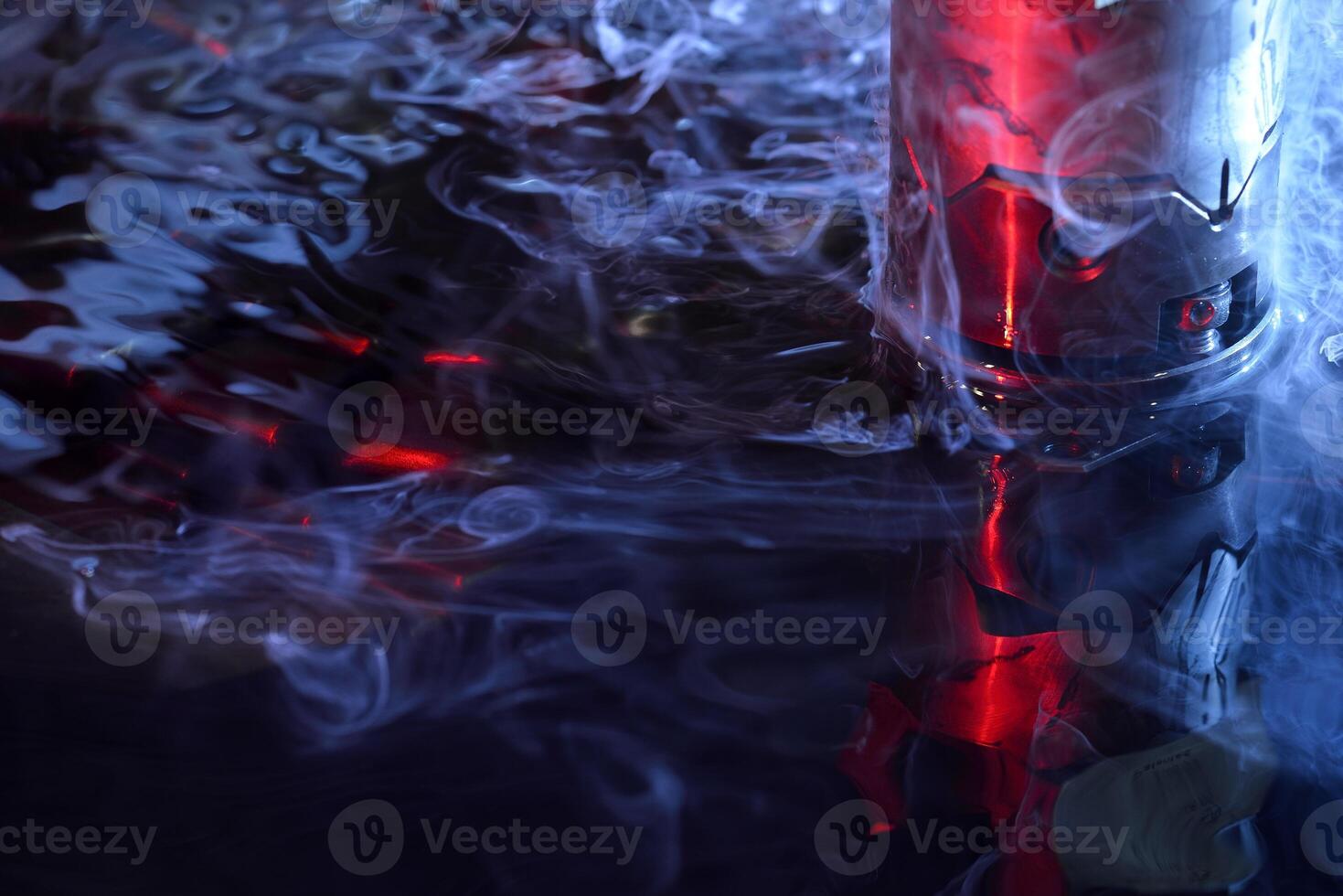 machine working on liquid with red and blue illumination photo