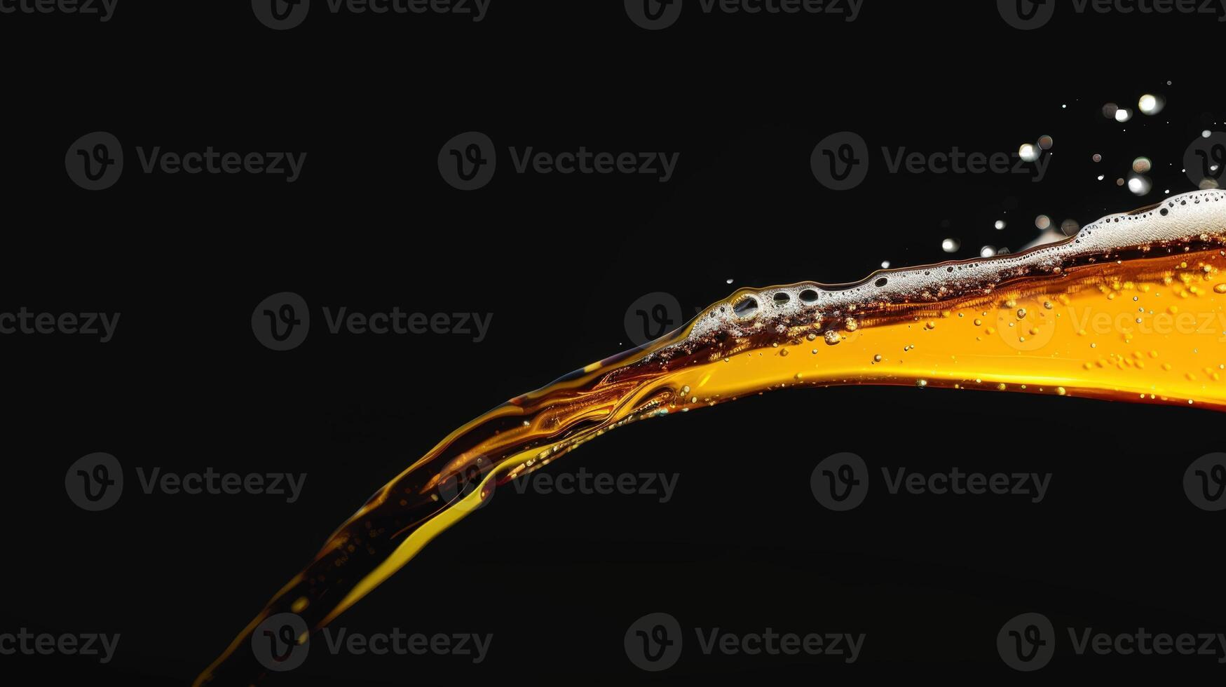 Beer pouring from a bottle against a black background creating bubbles and splashes photo