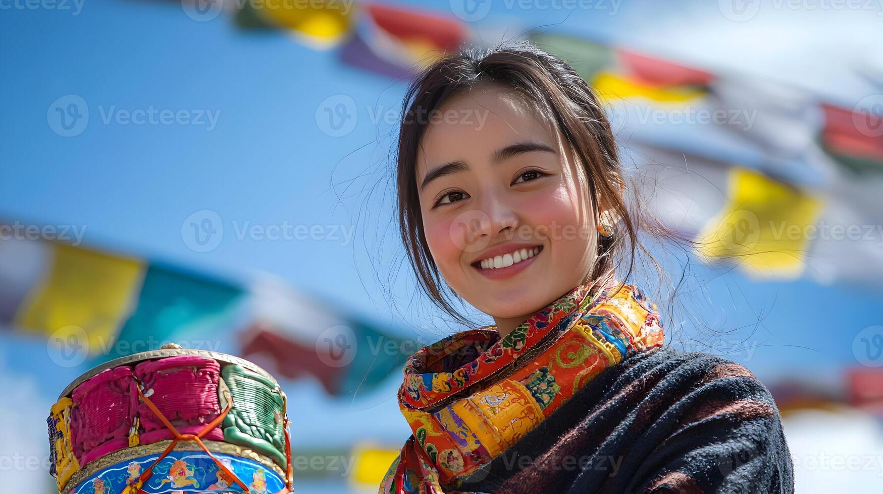 Tibetan Woman with Colorful Prayer Wheel photo