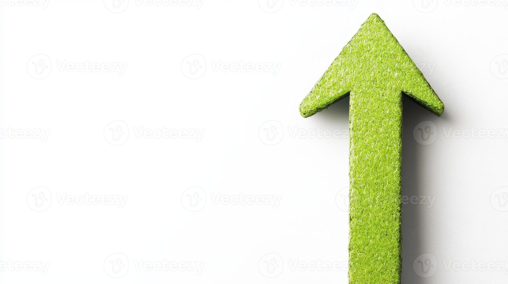 A green arrow pointing upward on a white background photo