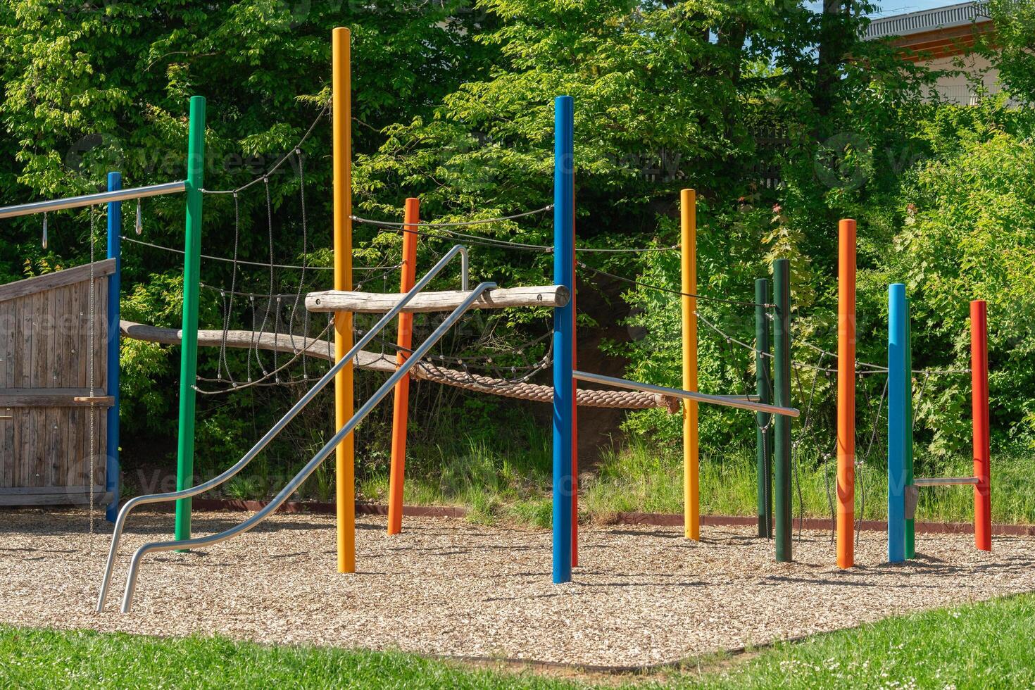 Colorful Playground with Slide in a Sunny Park photo