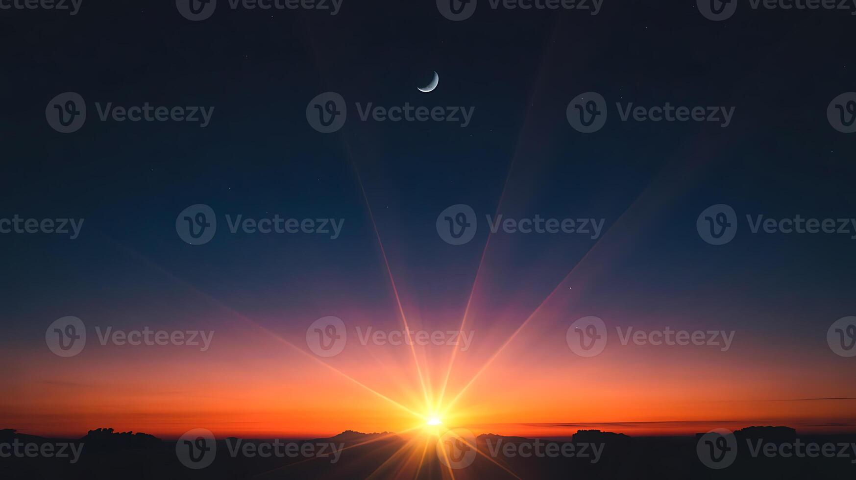 The sun is setting over a mountain range photo
