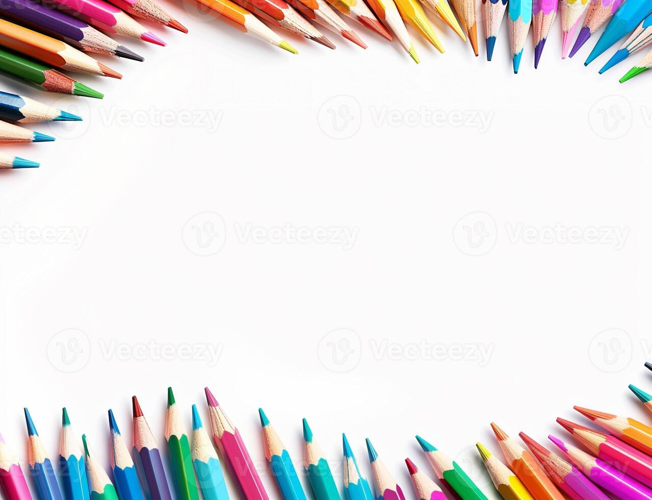 A beautiful row of colourful pencils are arranged in a circle on a white background photo