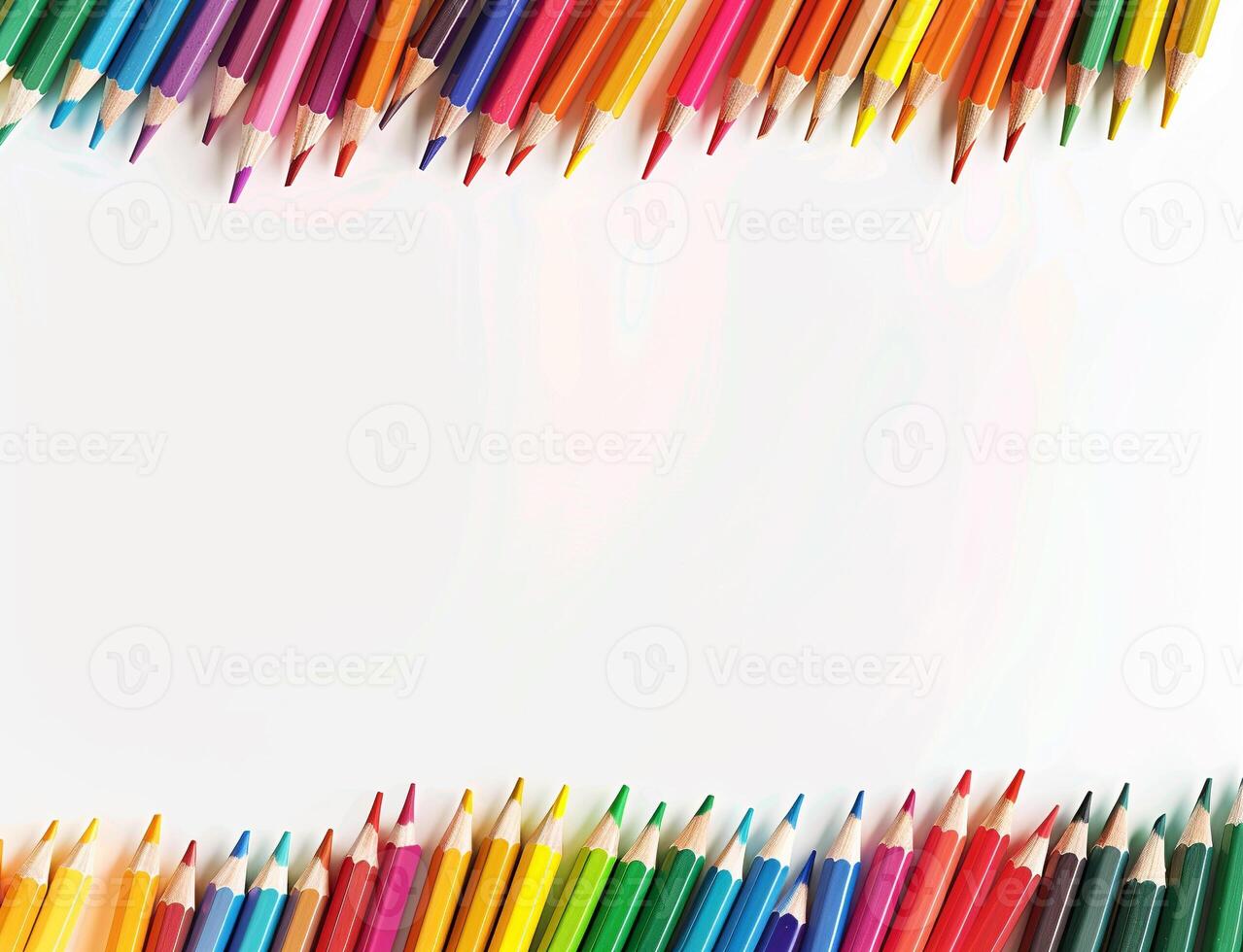 A row of colourful pencils on a white background photo