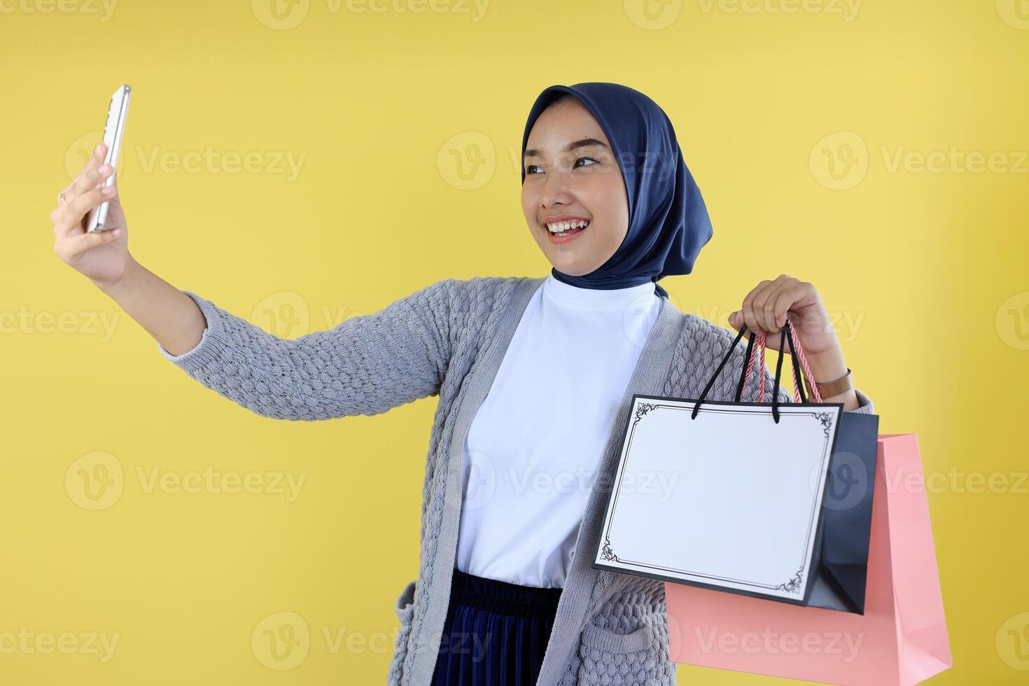 Young Asian Female Selfie with with Paperbag photo