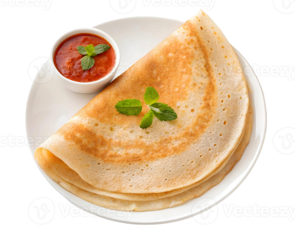 Delicious dosa served with chutney and garnished with mint leaves on a white plate png