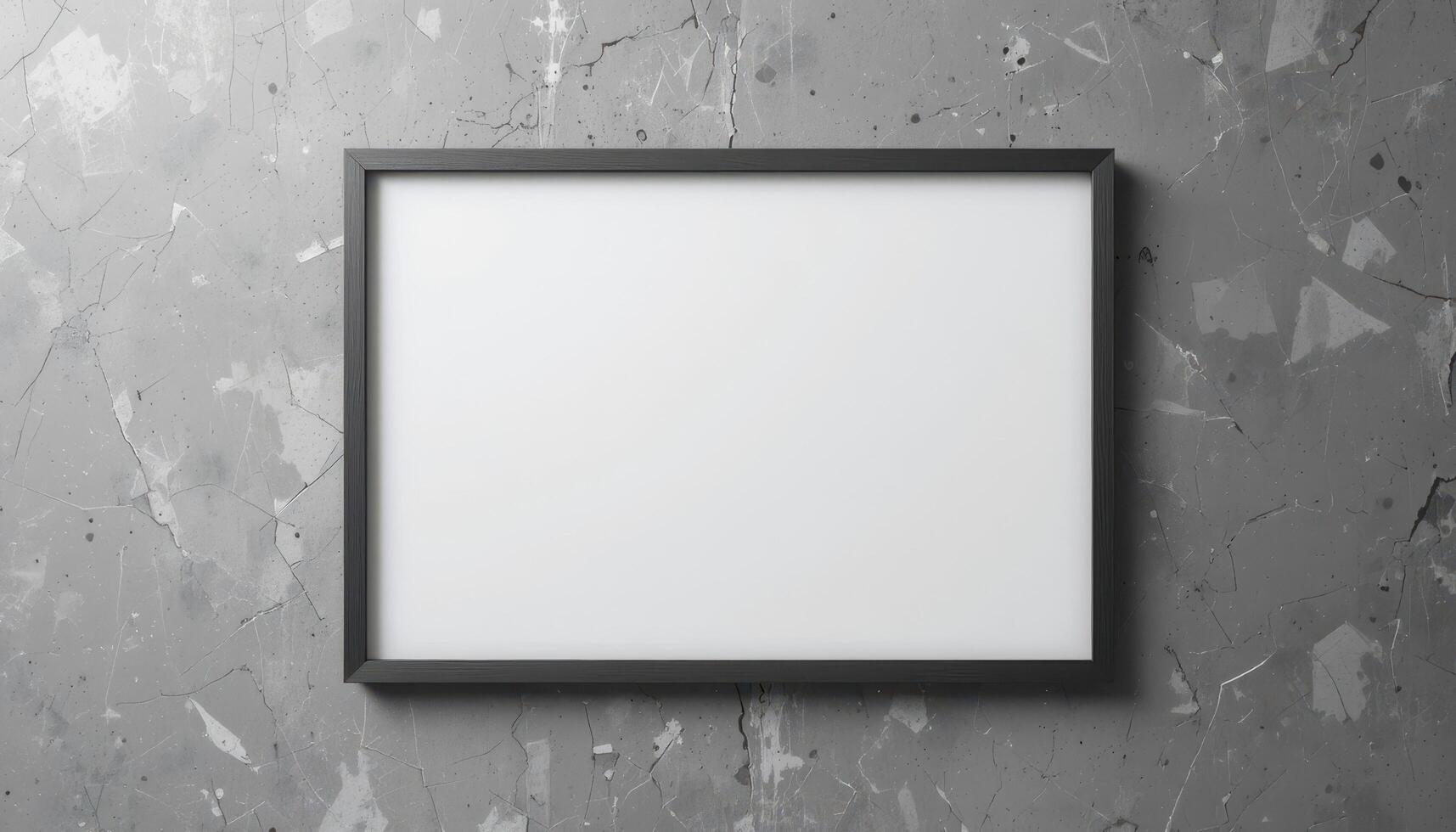 Empty picture frame on a gray concrete wall. photo