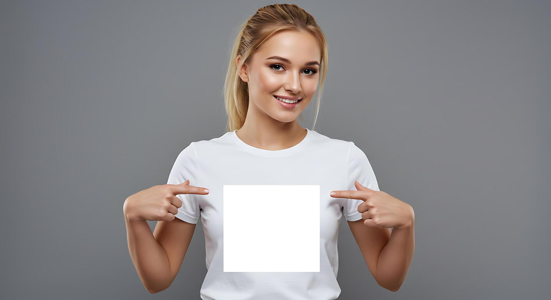 A woman in a white t - shirt holding up a blank white board photo
