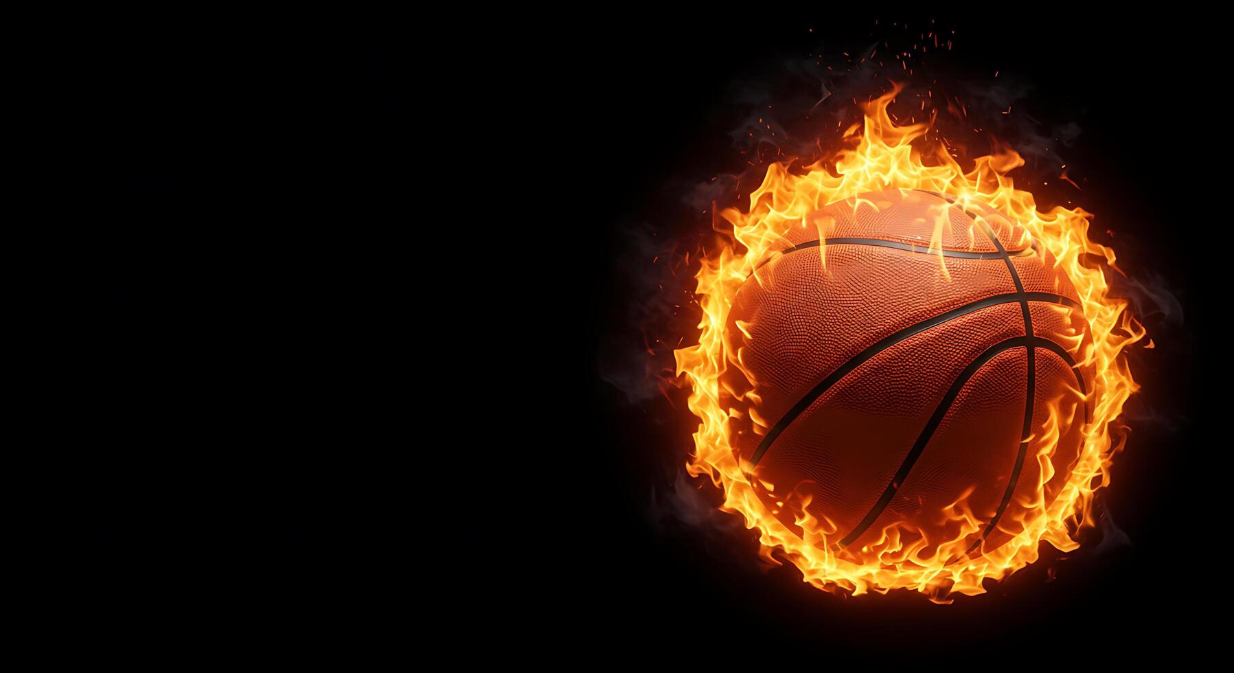Basketball ball in fire on black background photo