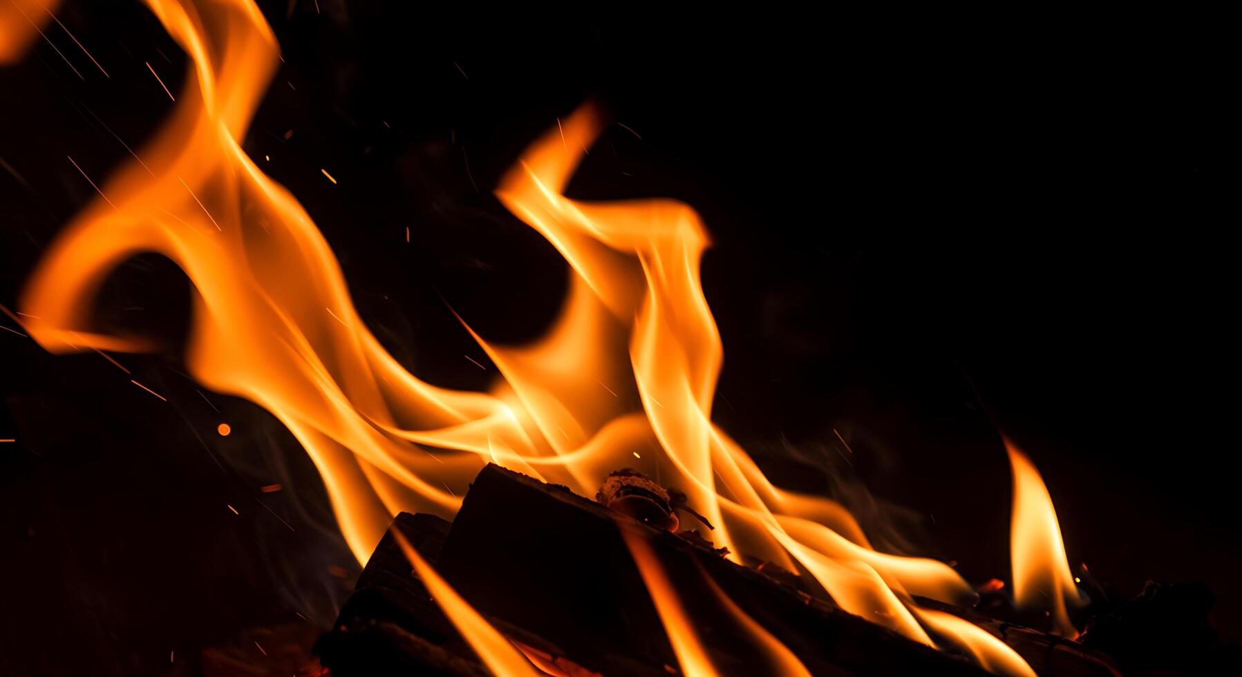 A close up of a fire with flames and smoke photo