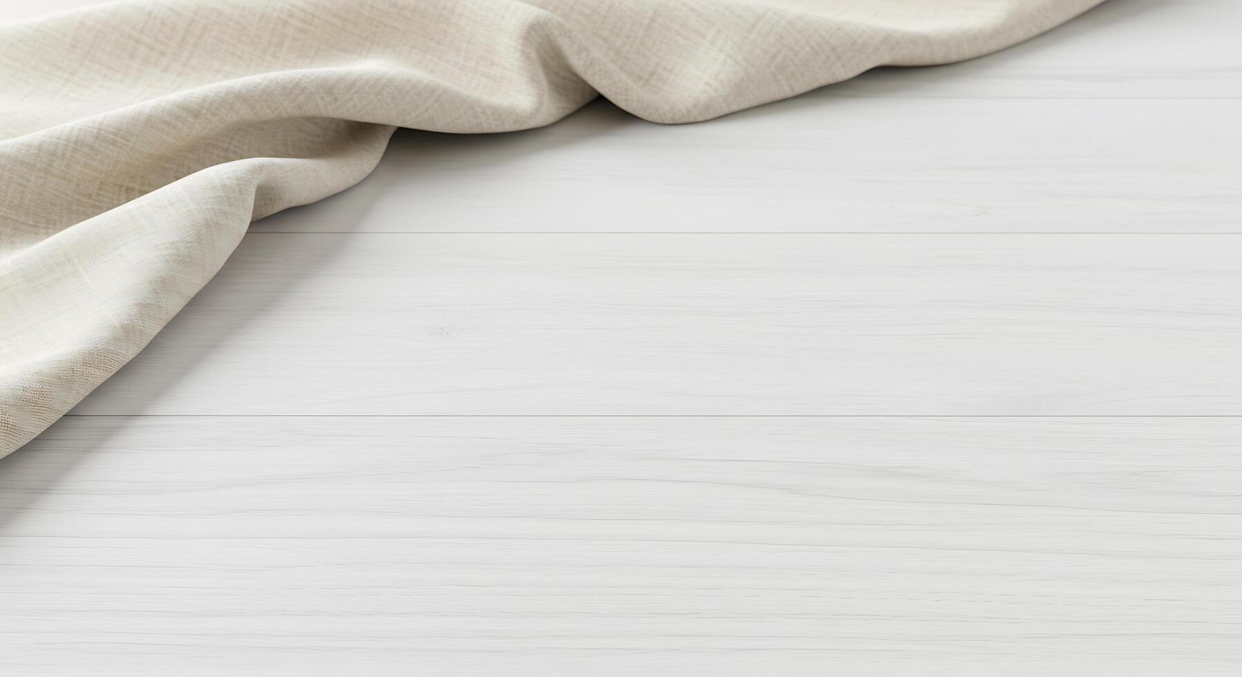 White cloth on wooden floor photo