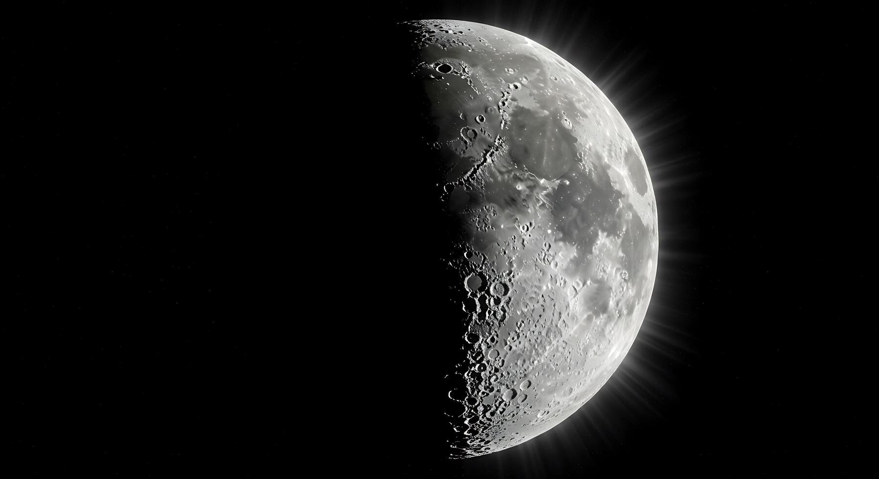 The moon is shown in the dark sky with a bright light shining photo