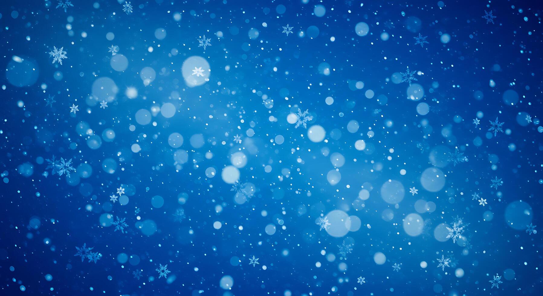 Snowflakes falling on a blue background photo