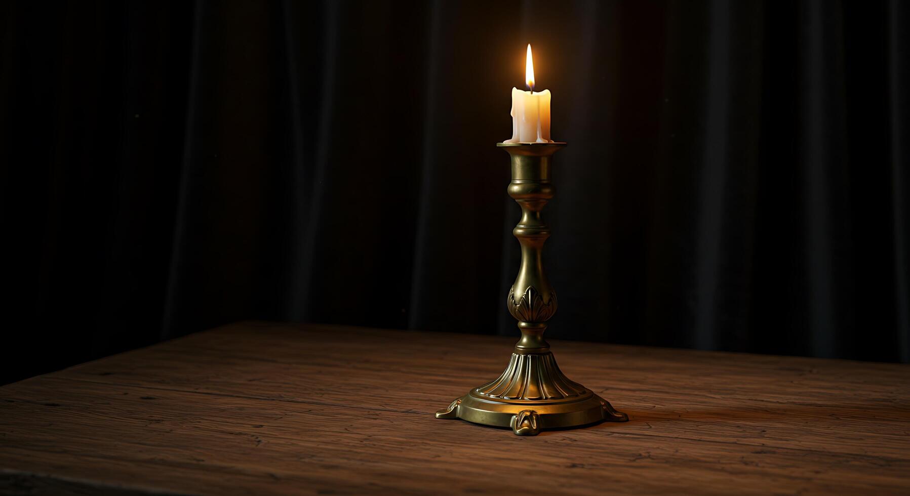 A candle is lit on a table in front of a curtain photo