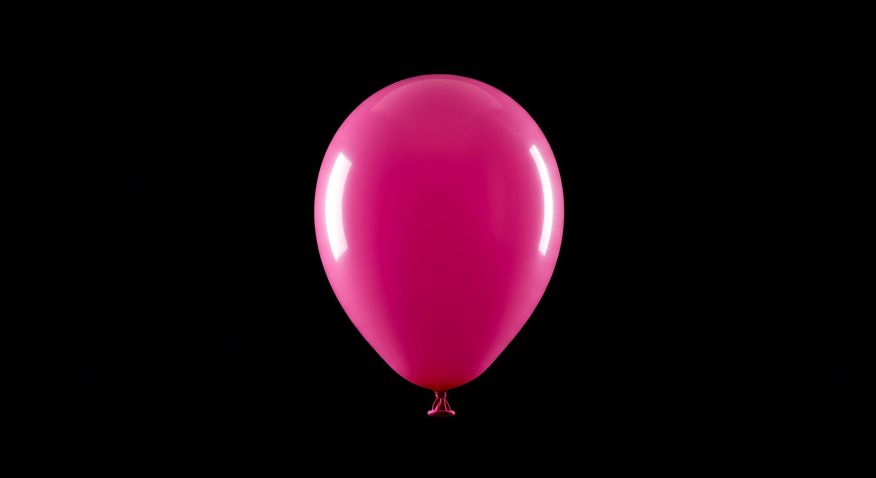 A pink balloon is shown against a black background photo