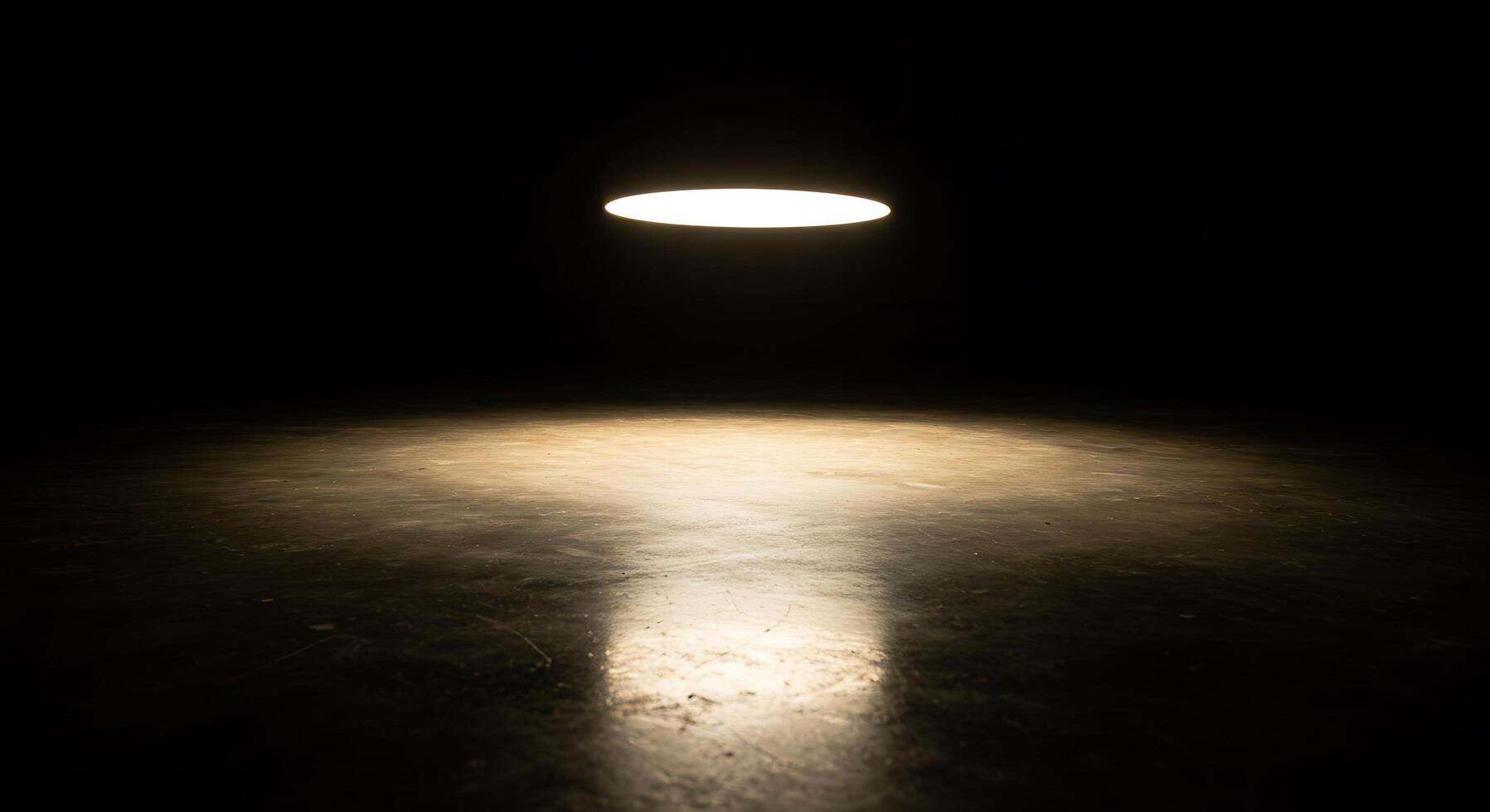 A light shining on a dark floor photo
