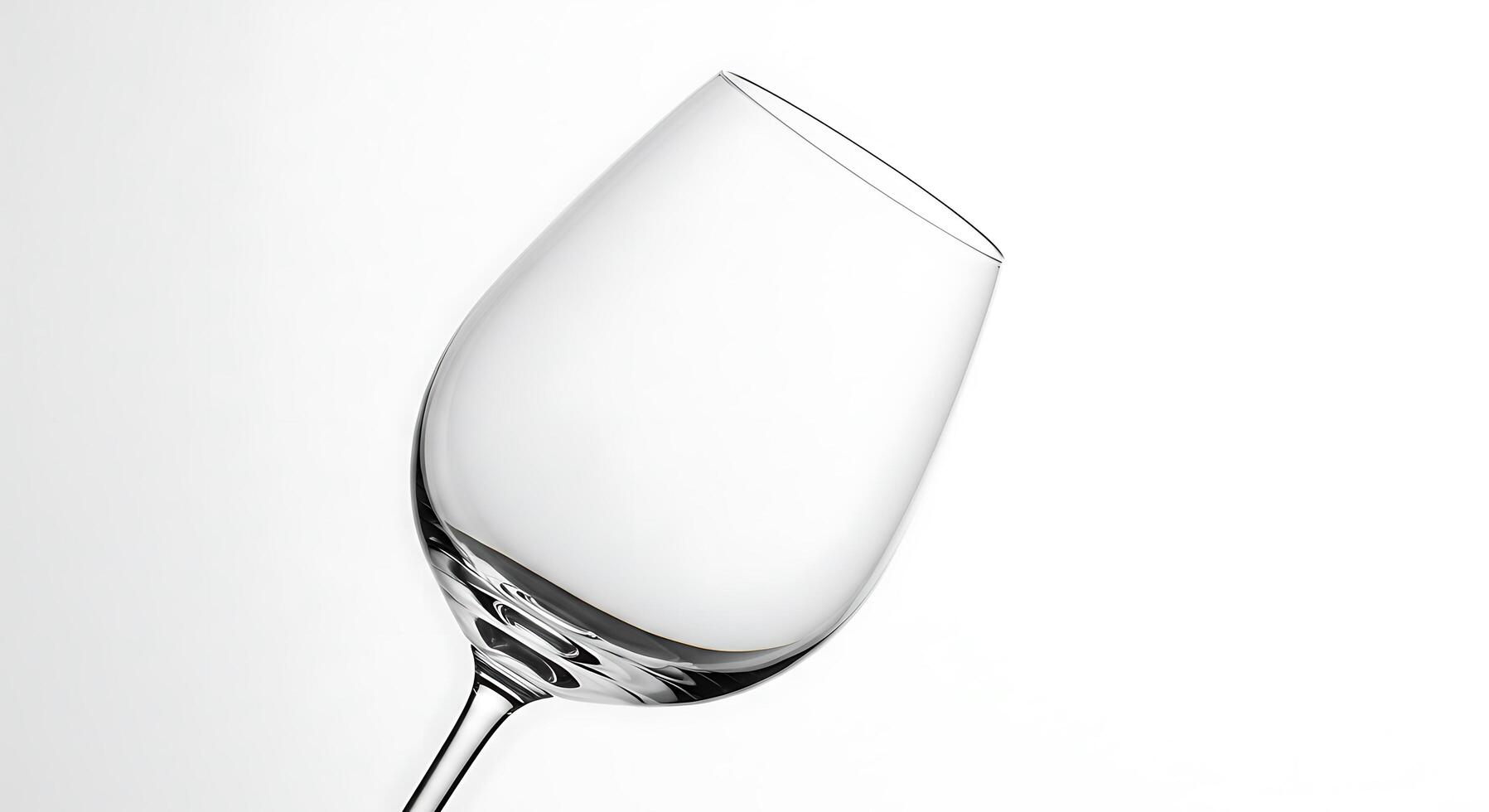 A wine glass is shown on a white background photo