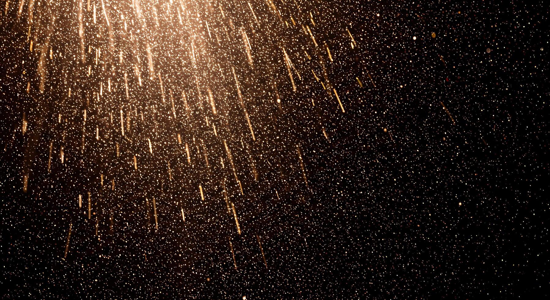 A close up of a sparkler on a black background photo