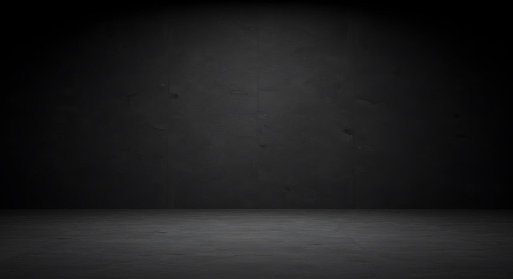An empty room with a dark wall and floor photo