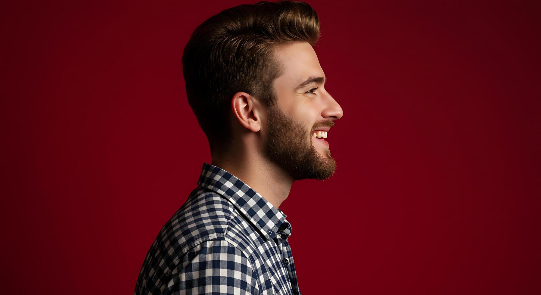 A man with a beard and a checkered shirt photo