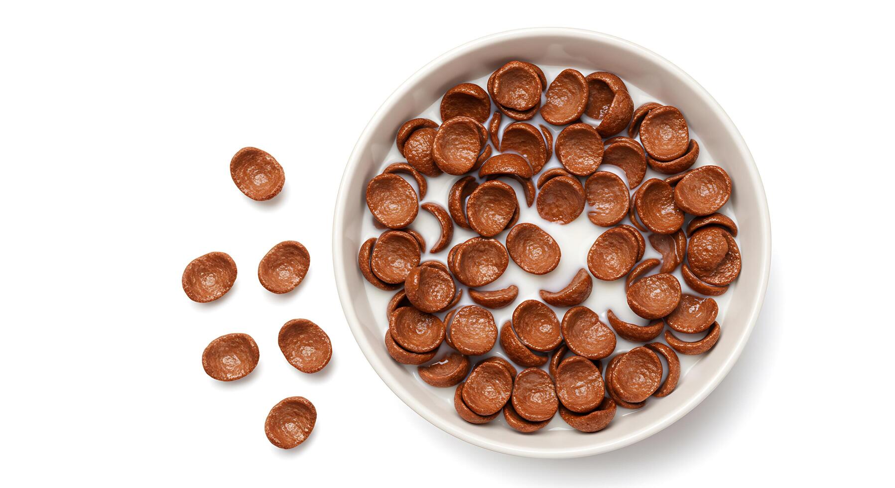Chocolate chips in a bowl on a white surface photo