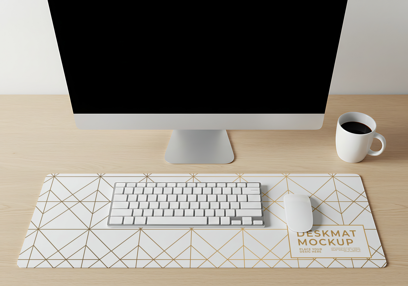A clean workspace featuring a geometric deskmat keyboard mouse computer and coffee psd