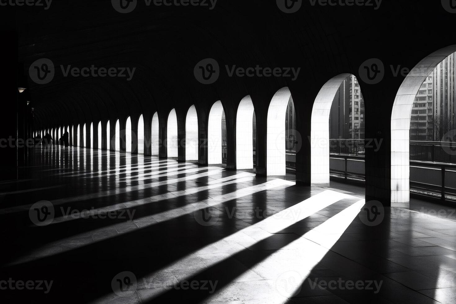 Sunlight creating strong shadows in archway of modern building photo