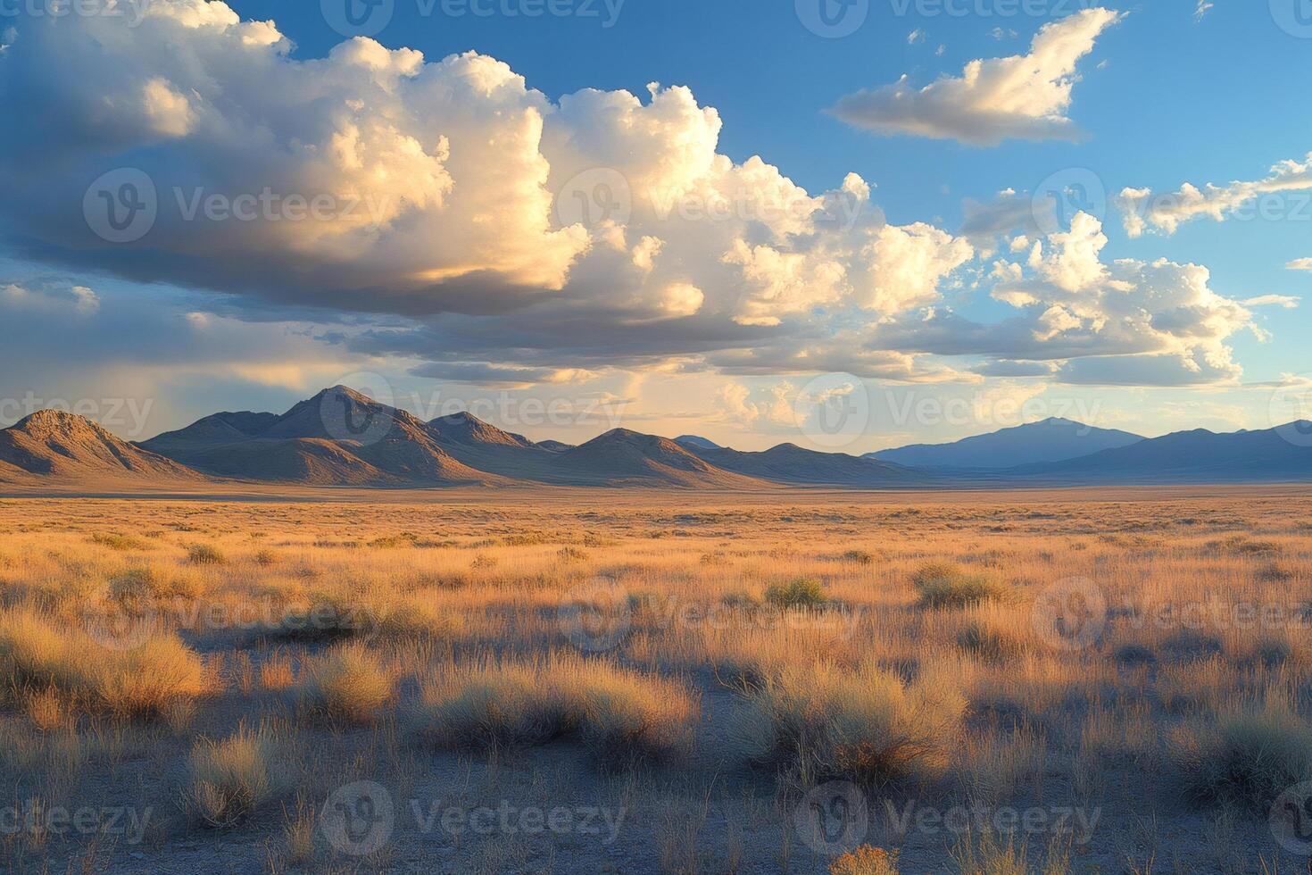 Vast nevada desert landscape with mountains and clouds at sunset photo