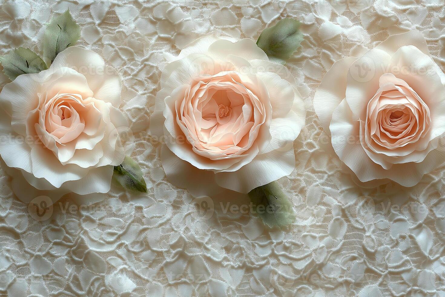 Soft silk roses arranged elegantly on delicate lace fabric for a romantic display. photo