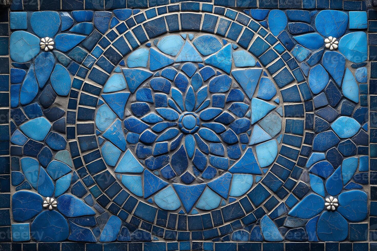 Intricate blue mosaic tile art showcasing floral designs and geometric patterns in a vibrant display. photo