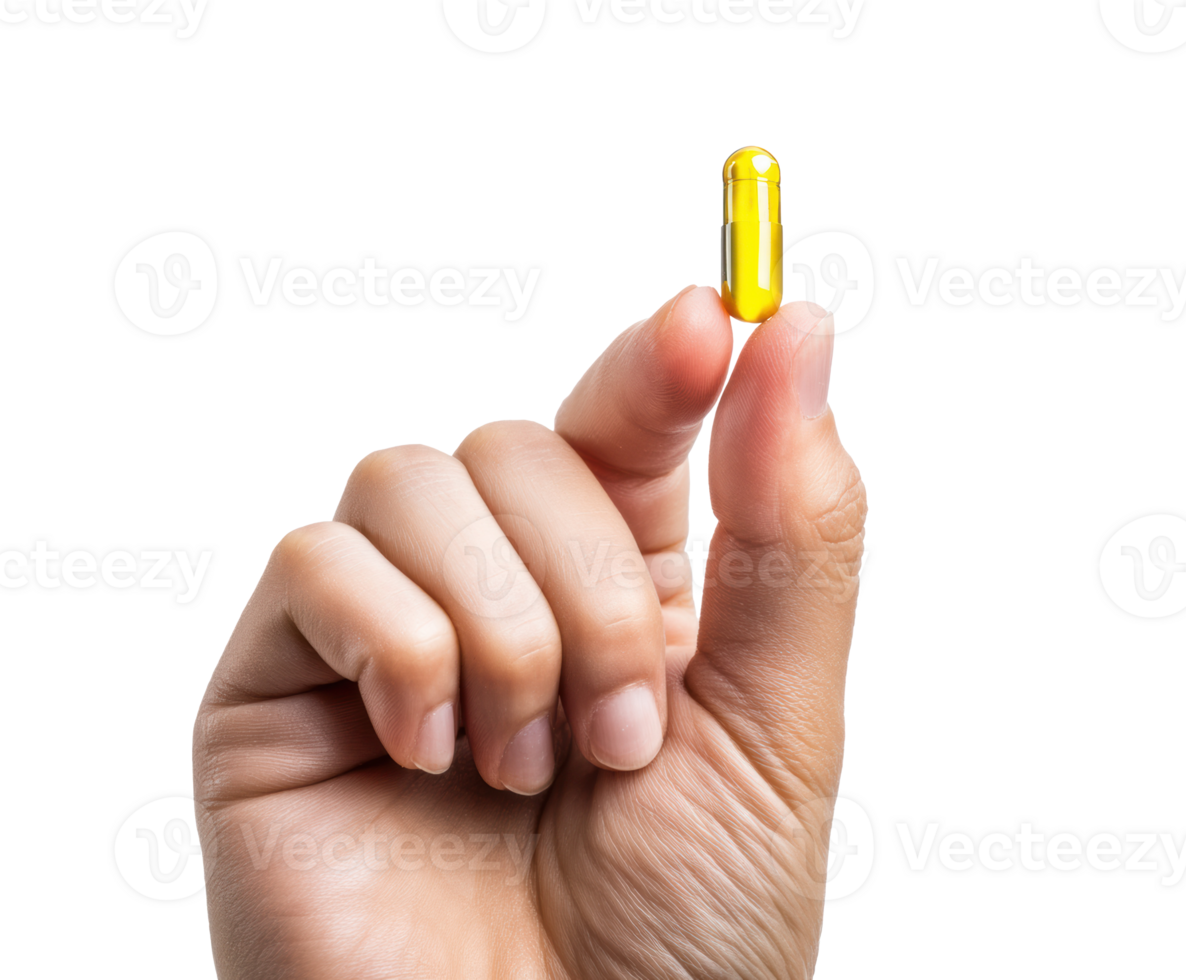 Bright yellow capsule held by a hand for health and wellness png
