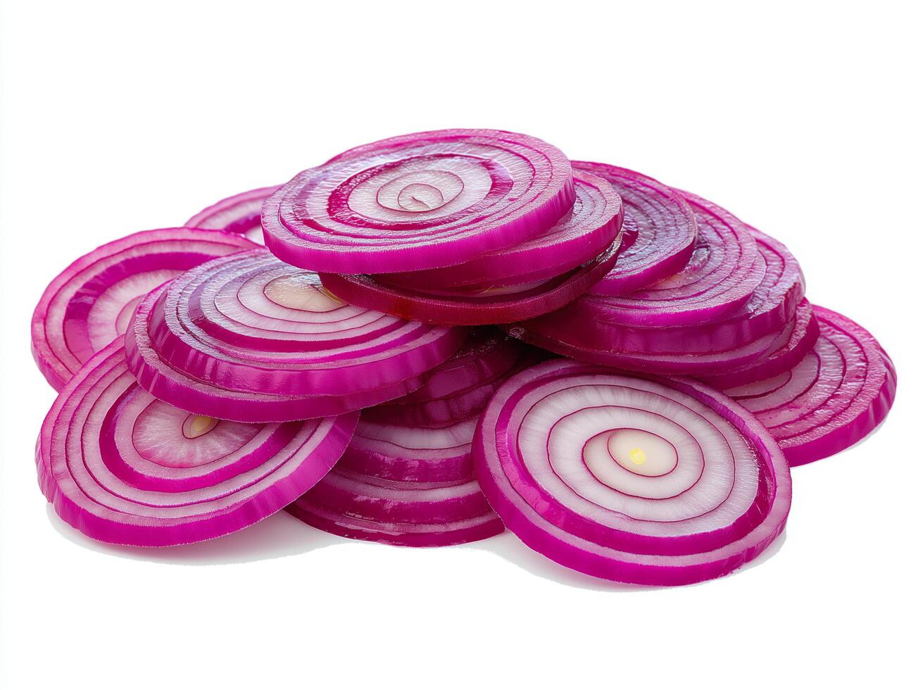 Sliced red onions arranged neatly, showcasing vibrant rings against a white background. photo
