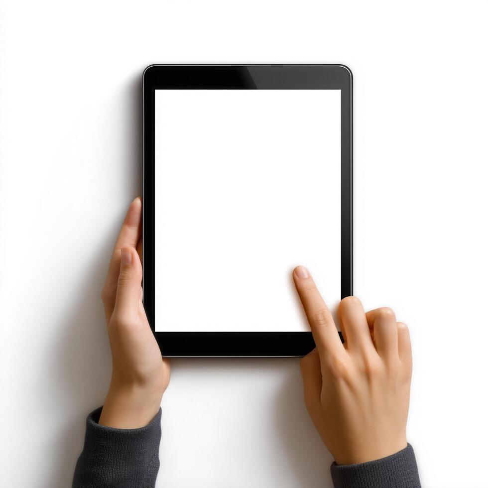 Hands holding a tablet with blank screen. photo