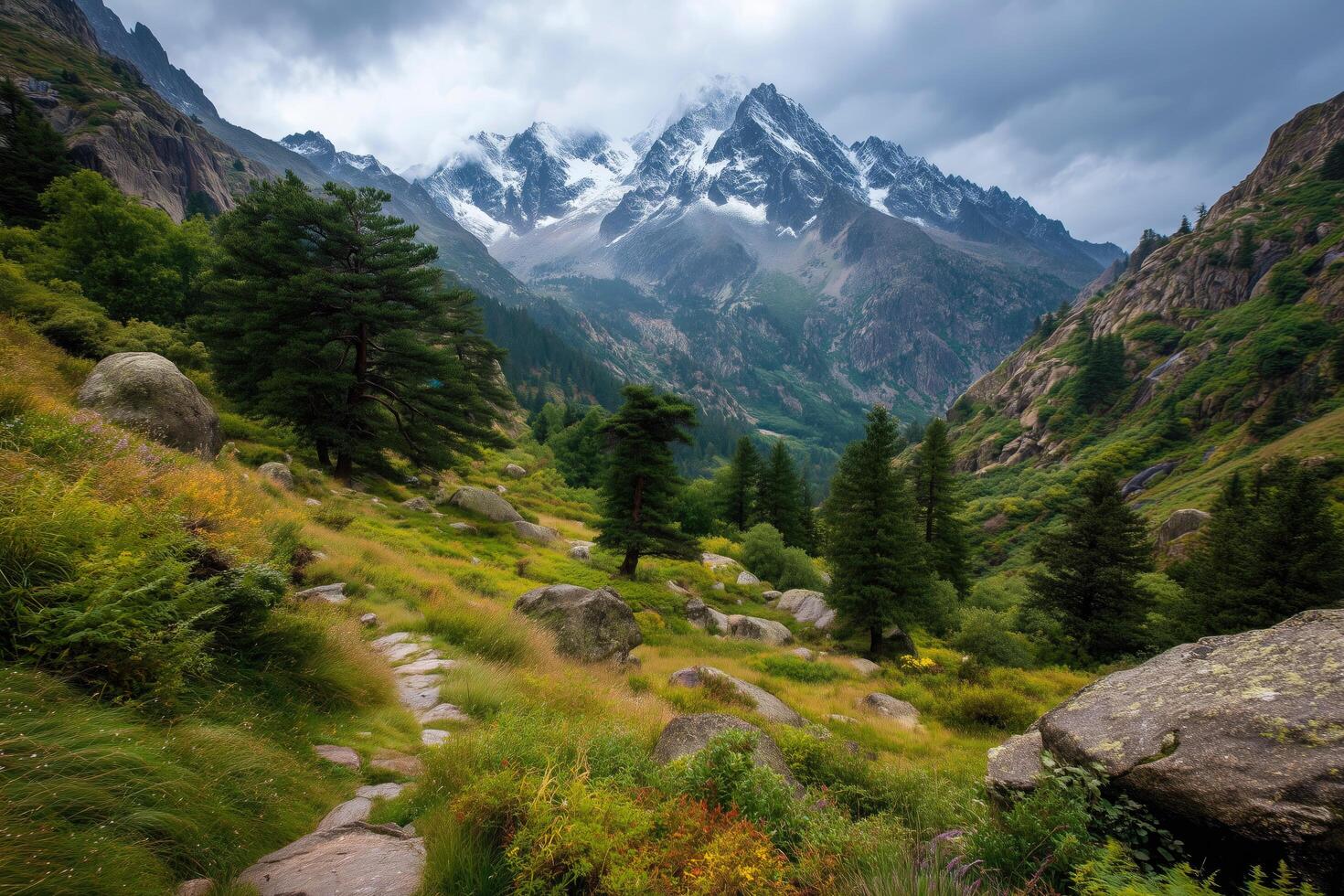 Scenic mountain view with lush greenery and cloudy sky. photo