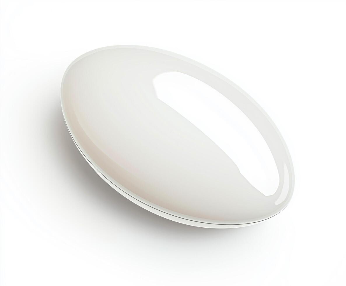 White pill is sitting on a white background photo