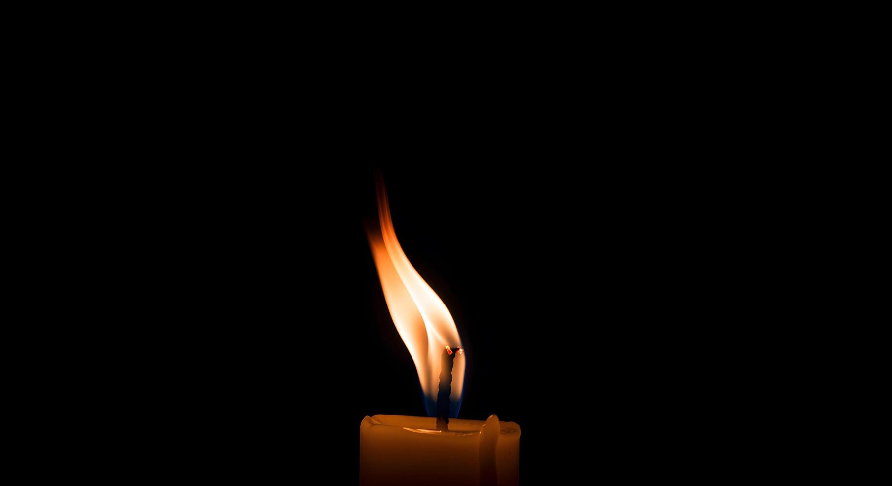 Candle Flame on Black photo
