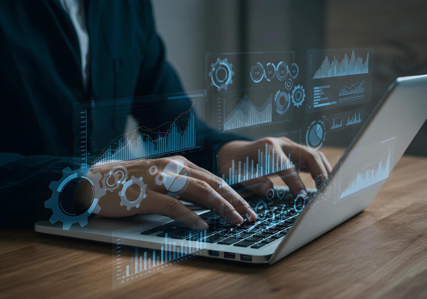 Person Typing with Data Visualization on Laptop photo