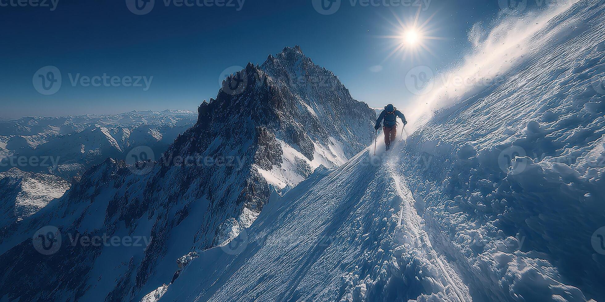 Skiing down a snowy mountain slope under a bright sun in the beautiful alpine landscape photo