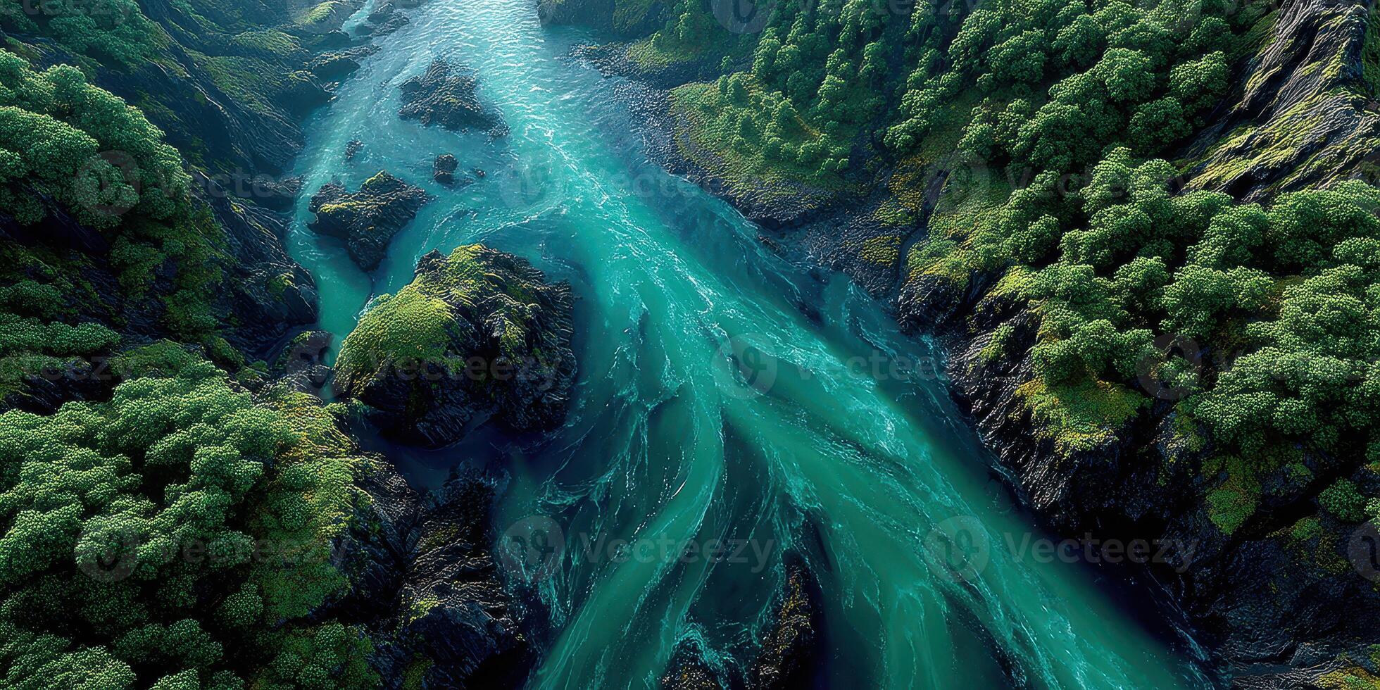 Flowing turquoise river winding through lush forested mountains at dawn photo