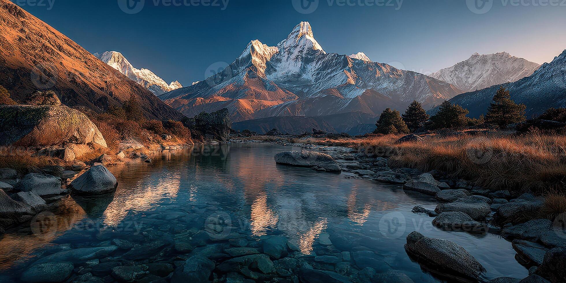 Majestic mountain range reflects in tranquil river at dusk in a remote valley photo
