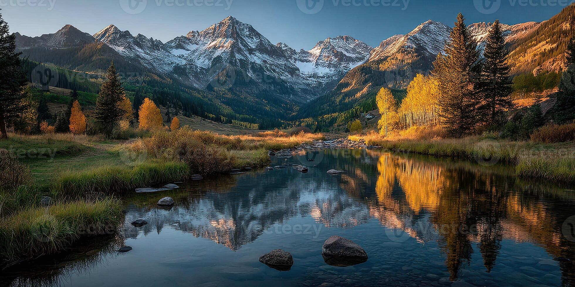 Majestic mountains reflect in serene river at dawn in colorful autumn landscape photo