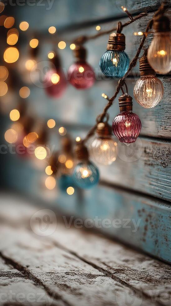 Decorative string lights with colorful glass bulbs illuminate a rustic wooden backdrop in a cozy setting photo