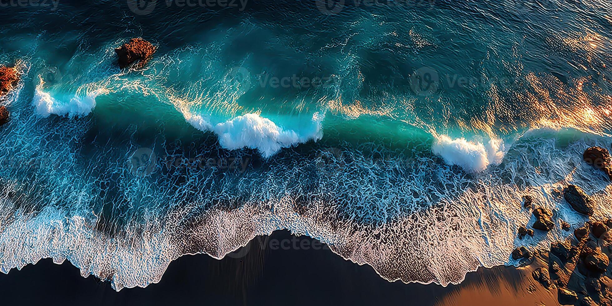 Waves crashing along a serene shoreline at sunset with vibrant blue hues and rocky formations photo